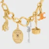 Charms CELINE Triomphe en esmalte y latón con acabado dorado Charms CELINE Triomphe en esmalte y latón con acabado dorado