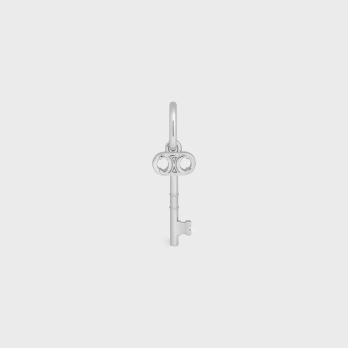 Charms Llave Triomphe en latón con acabado de rodio Charms Llave Triomphe en latón con acabado de rodio
