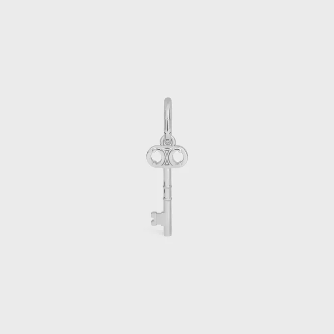 Charms Llave Triomphe en latón con acabado de rodio Charms Llave Triomphe en latón con acabado de rodio