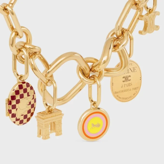 Charms Medalla Sulky en esmalte y latón con acabado dorado Charms Medalla Sulky en esmalte y latón con acabado dorado