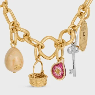 Charms Fig en latón con acabado dorado, esmalte y strass