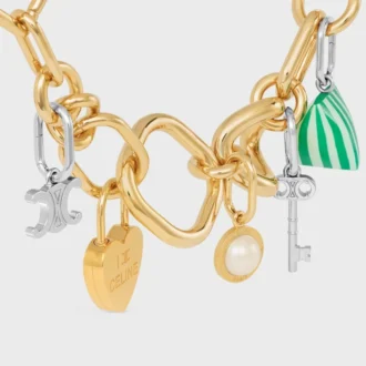 Charms Perla de resina y latón con acabado dorado Charms Perla de resina y latón con acabado dorado
