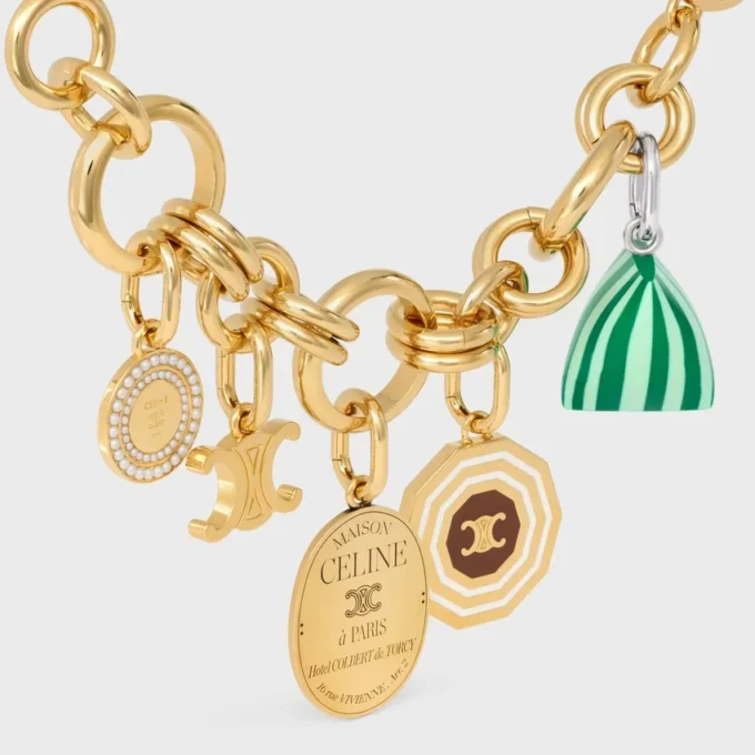 Pulsera gruesa CELINE Charms Heritage en latón con acabado dorado