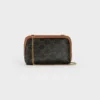 Clutch con cadena en Triomphe Canvas y piel de cordero Clutch con cadena en Triomphe Canvas y piel de cordero