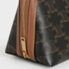Clutch con cadena en Triomphe Canvas y piel de cordero Clutch con cadena en Triomphe Canvas y piel de cordero