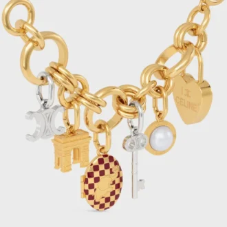 Charms Llave Triomphe en latón con acabado de rodio