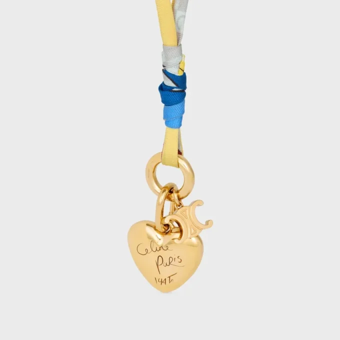 Collar CELINE Charms Cordon en seda y latón con acabado dorado Collar CELINE Charms Cordon en seda y latón con acabado dorado