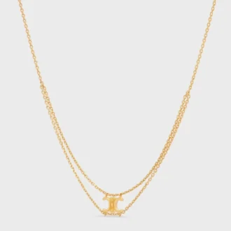 Collar colgante Triomphe en latón con acabado dorado