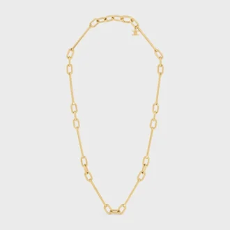 Collar con dijes de latón con acabado dorado