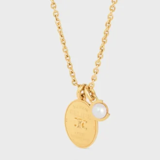 Collar con medalla CELINE de resina perla y latón con acabado dorado