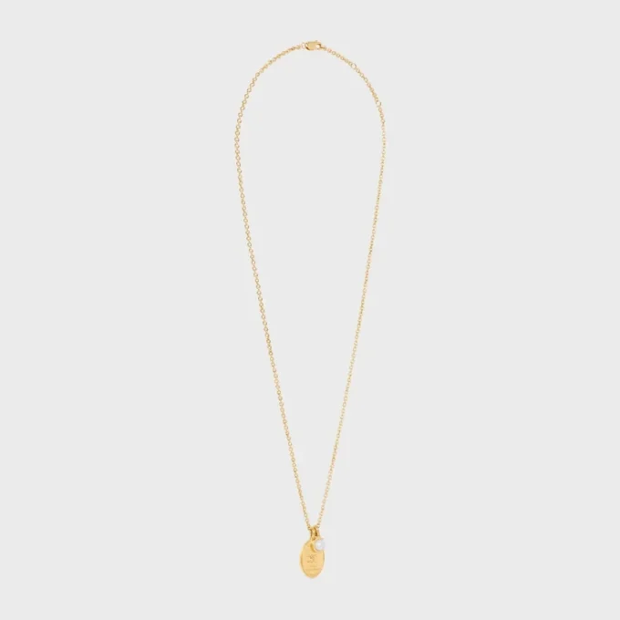 Collar con medalla CELINE de resina perla y latón con acabado dorado Collar con medalla CELINE de resina perla y latón con acabado dorado