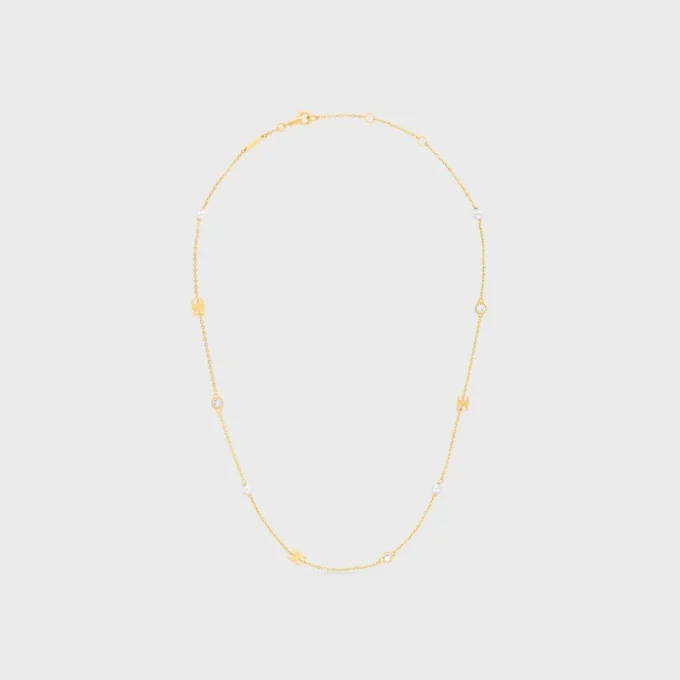Collar Les Perles CELINE de strass, perlas de resina y latón con acabado dorado Collar Les Perles CELINE de strass, perlas de resina y latón con acabado dorado