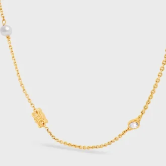Collar Les Perles CELINE de strass, perlas de resina y latón con acabado dorado