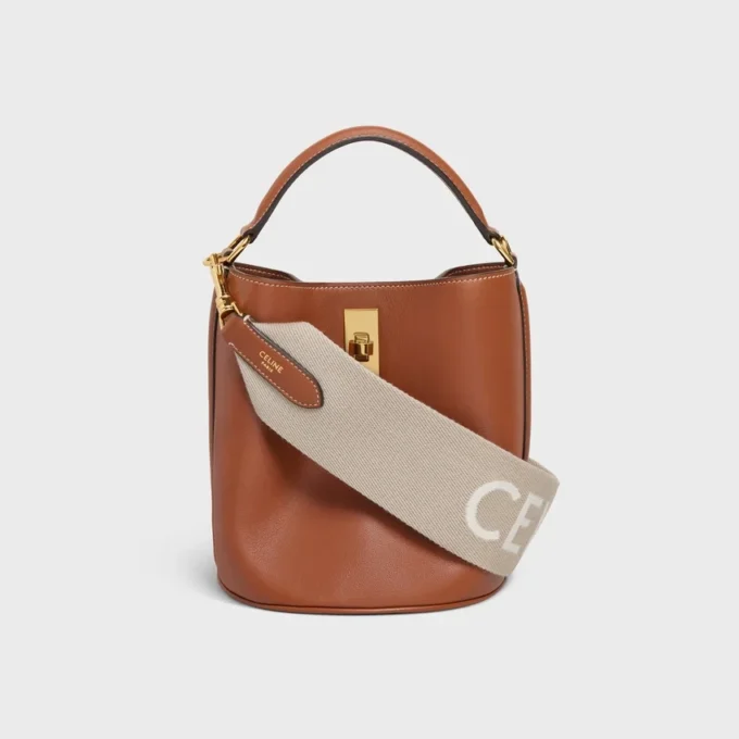 Correa corta de lana con jacquard CELINE y acabado dorado Correa corta de lana con jacquard CELINE y acabado dorado