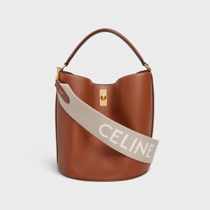 Correa corta de lana con jacquard CELINE y acabado dorado Correa corta de lana con jacquard CELINE y acabado dorado