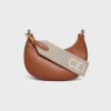Correa corta de lana con jacquard CELINE y acabado dorado Correa corta de lana con jacquard CELINE y acabado dorado