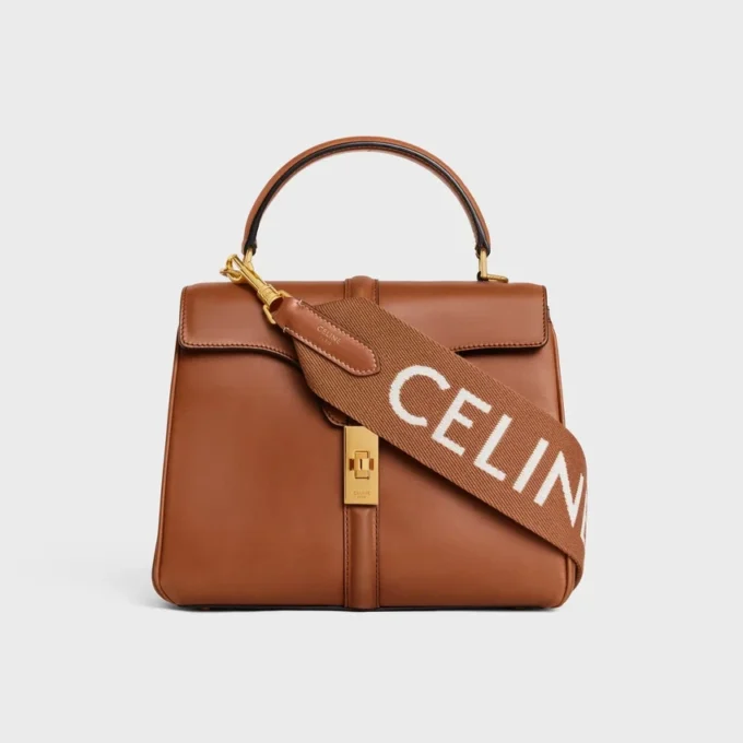 Correa larga de lana con jacquard de CELINE y acabado dorado Correa larga de lana con jacquard de CELINE y acabado dorado