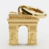 Dije Arco de Triomphe en latón con acabado dorado