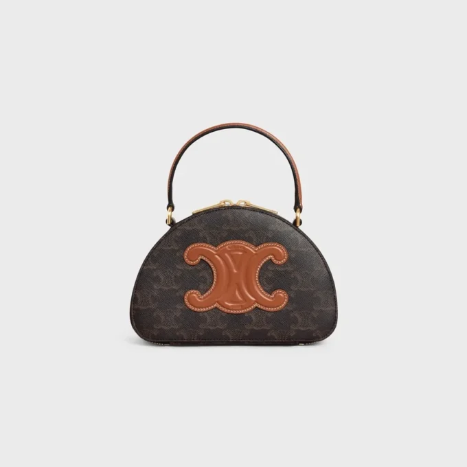 Estuche Half Moon en Triomphe Canvas y piel de becerro Estuche Half Moon en Triomphe Canvas y piel de becerro
