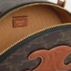 Estuche Half Moon en Triomphe Canvas y piel de becerro Estuche Half Moon en Triomphe Canvas y piel de becerro