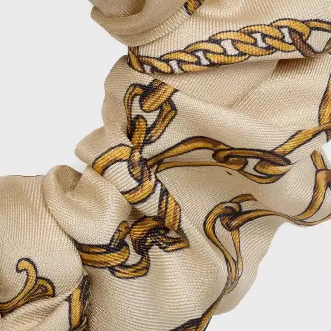 Goma para el pelo con lazo y cadenas de CELINE en seda