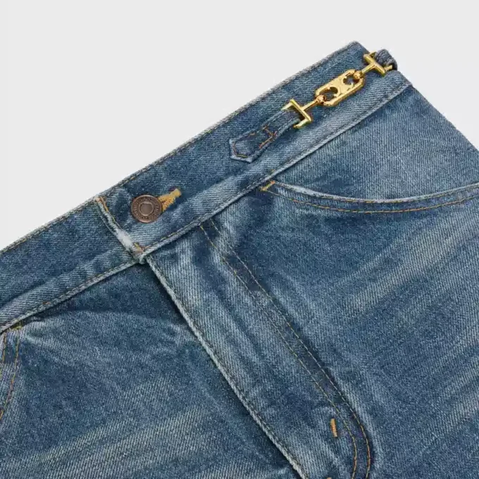 Jeans acampanados Dylan con firma en denim de algodón Jeans acampanados Dylan con firma en denim de algodón