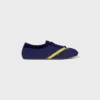 Las zapatillas planas en grosgrain, terciopelo, piel de becerro y piel de cordero Las zapatillas planas en grosgrain, terciopelo, piel de becerro y piel de cordero