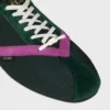 Las zapatillas planas en grosgrain, terciopelo, piel de becerro y piel de cordero