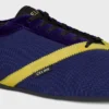 Las zapatillas planas en grosgrain, terciopelo, piel de becerro y piel de cordero Las zapatillas planas en grosgrain, terciopelo, piel de becerro y piel de cordero