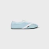 Las zapatillas planas en grosgrain, terciopelo, piel de cabra y piel de cordero