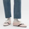 Las zapatillas planas en grosgrain, terciopelo, piel de cabra y piel de cordero