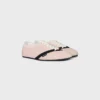 Las zapatillas planas en grosgrain, terciopelo, piel de cabra y piel de cordero