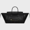 Luggage Big Smile en piel de cordero flexible y brillante