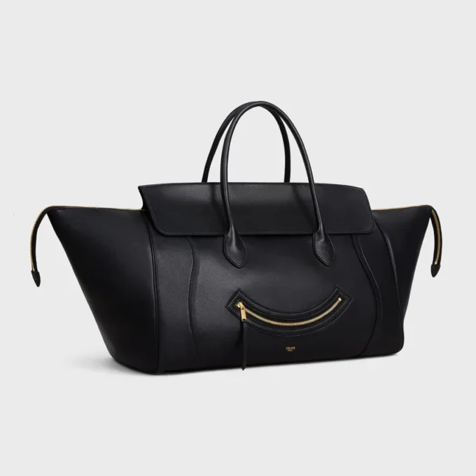 Luggage Big Smile en piel de cordero flexible y brillante