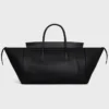 Luggage Big Smile en piel de cordero flexible y brillante