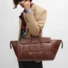 Luggage de piel de cordero flexible y brillante Luggage de piel de cordero flexible y brillante