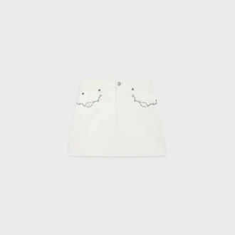Minifalda bordada en denim blanco con lavado crudo
