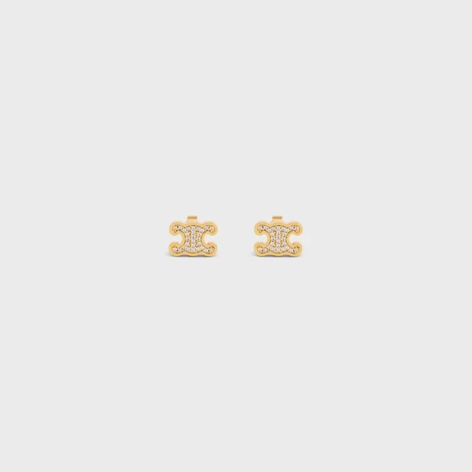 Pendientes de botón Triomphe con strass y latón con acabado dorado Pendientes de botón Triomphe con strass y latón con acabado dorado