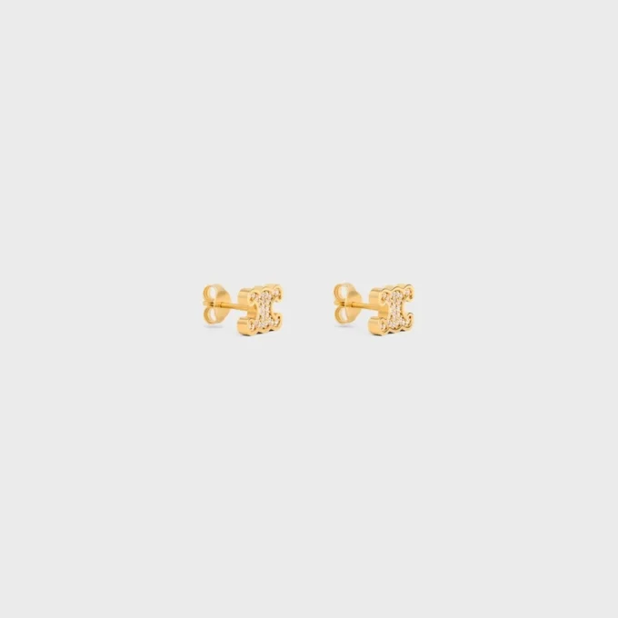 Pendientes de botón Triomphe con strass y latón con acabado dorado Pendientes de botón Triomphe con strass y latón con acabado dorado