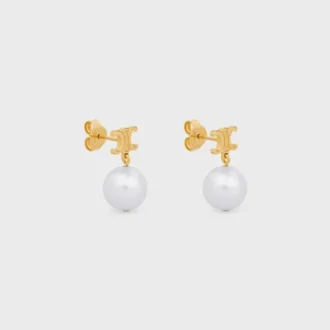 Pendientes Les Perles CELINE de latón con acabado dorado y perlas de resina