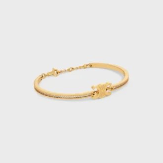 Pulsera articulada Triomphe con brillos en strass y latón con acabado dorado