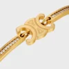 Pulsera articulada Triomphe con brillos en strass y latón con acabado dorado Pulsera articulada Triomphe con brillos en strass y latón con acabado dorado