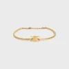 Pulsera articulada Triomphe en latón con acabado dorado Pulsera articulada Triomphe en latón con acabado dorado
