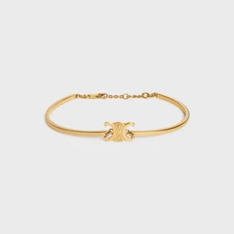 Pulsera articulada Triomphe en latón con acabado dorado