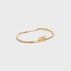 Pulsera articulada Triomphe en latón con acabado dorado Pulsera articulada Triomphe en latón con acabado dorado