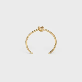Pulsera extrafina Knot en latón con acabado dorado