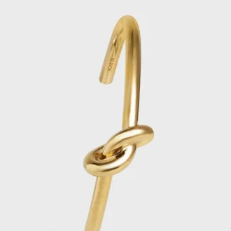 Pulsera extrafina Knot en latón con acabado dorado