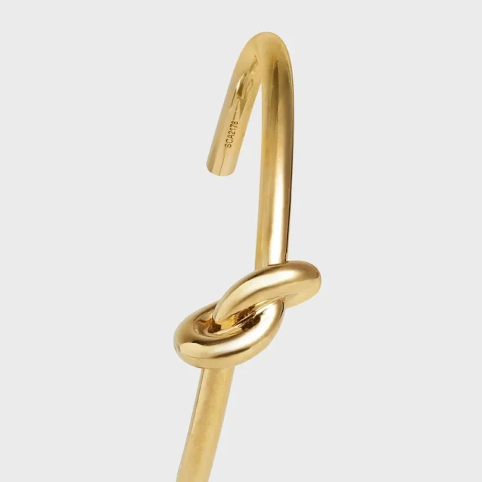 Pulsera extrafina Knot en latón con acabado dorado Pulsera extrafina Knot en latón con acabado dorado