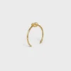 Pulsera extrafina Knot en latón con acabado dorado Pulsera extrafina Knot en latón con acabado dorado