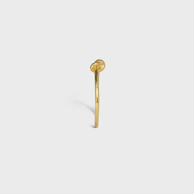 Pulsera extrafina Knot en latón con acabado dorado Pulsera extrafina Knot en latón con acabado dorado